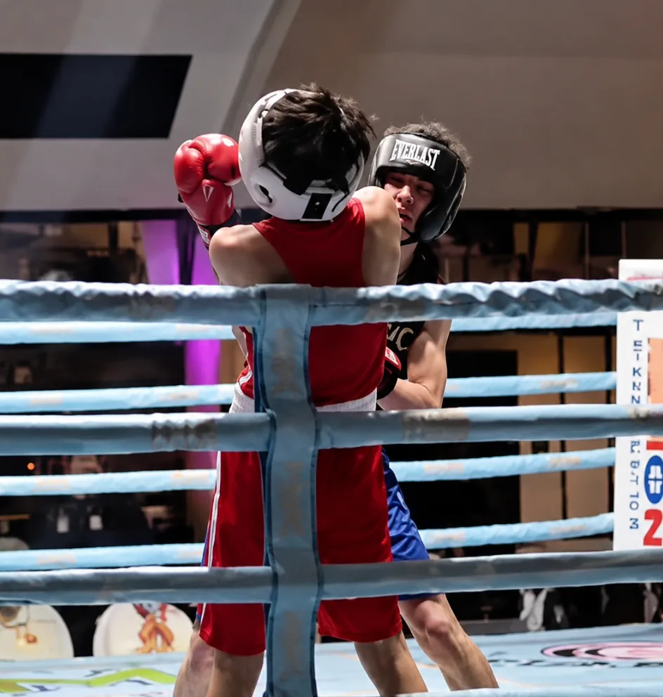 Romero's Boxing School athlete in action during a competition bout